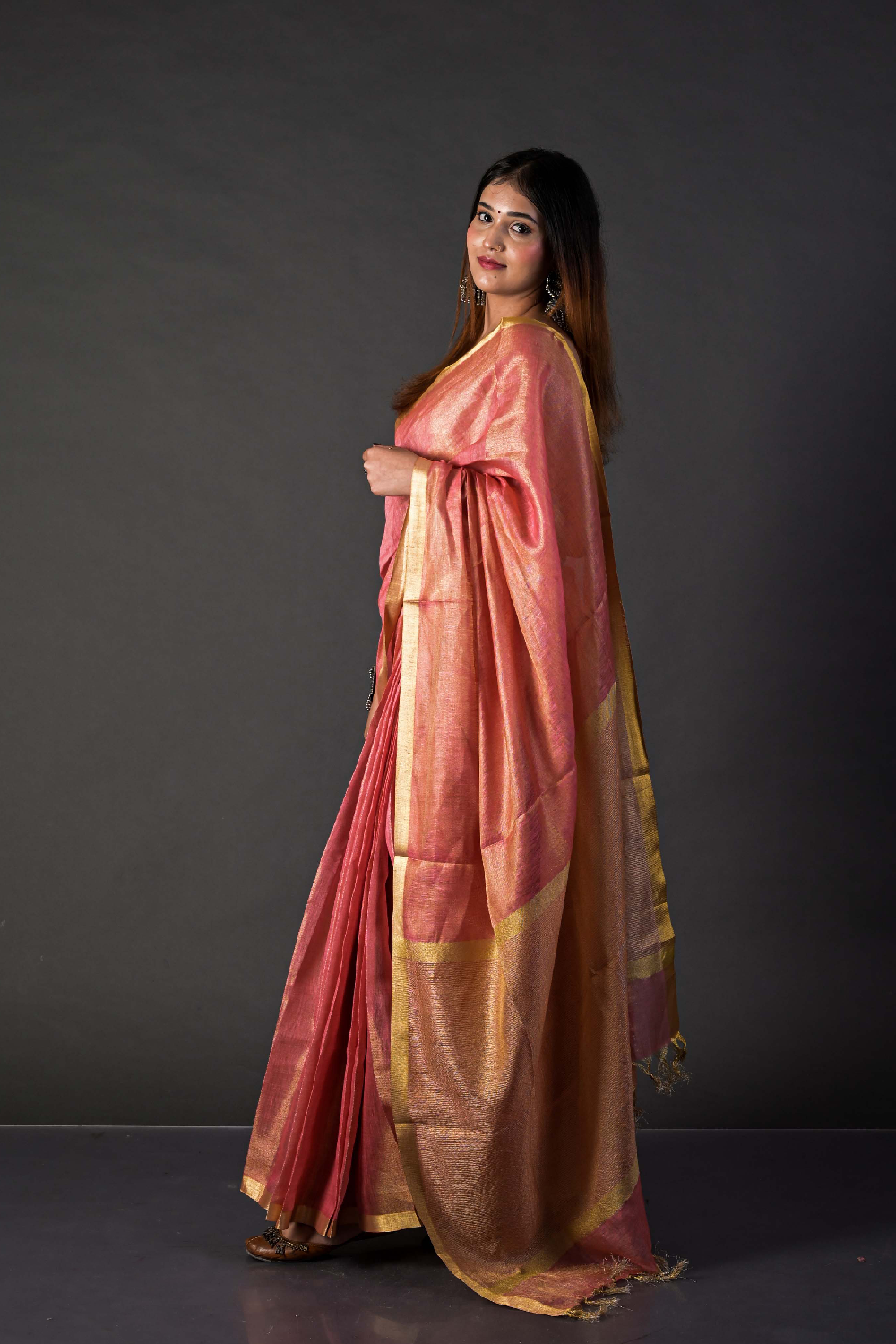 Tissue Linen saree crafted to celebrate timeless Indian craftsmanship with a contemporary touch.