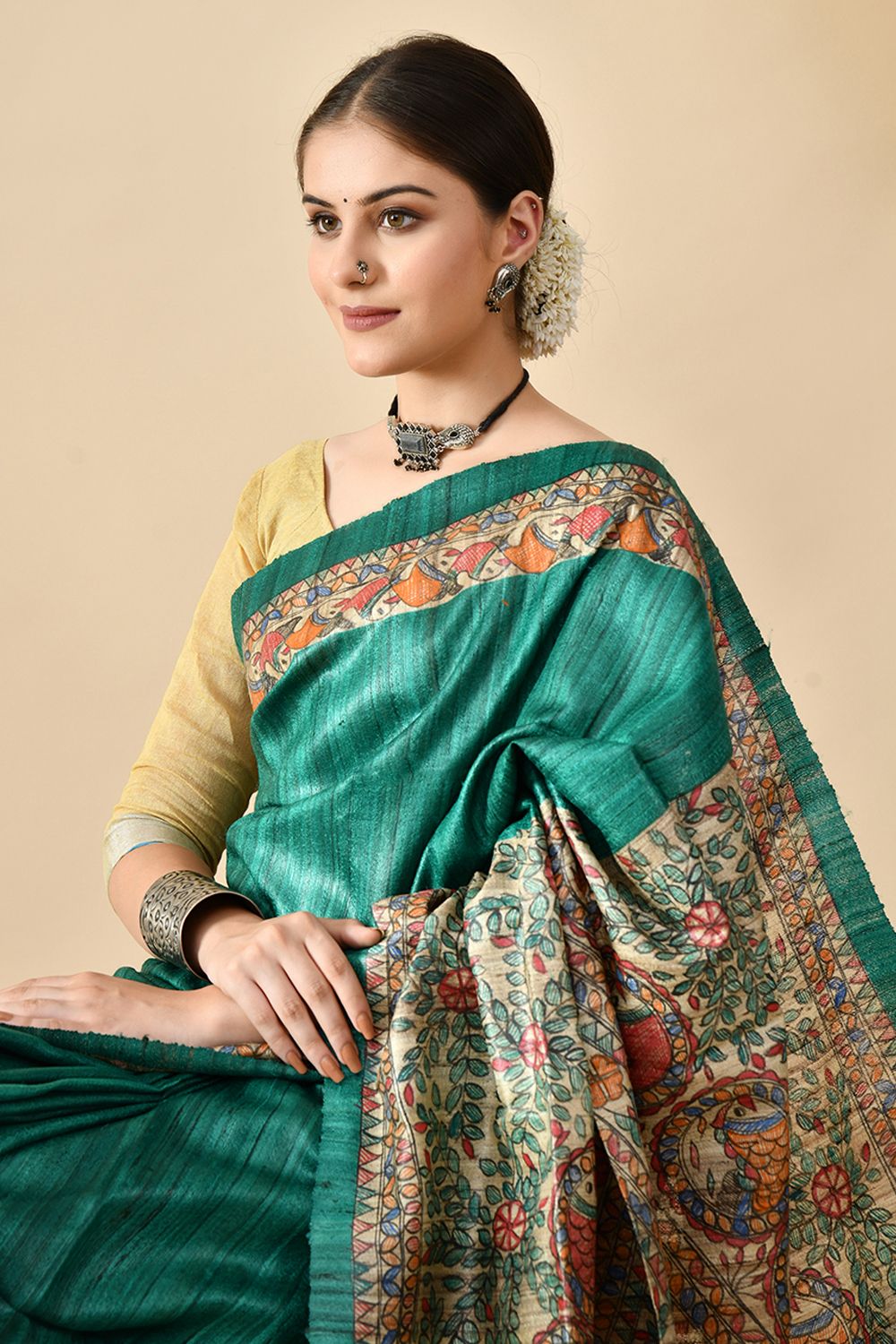 Elegant eco-friendly handwoven tussar silk saree in natural dye, 6.5 mtr length. Shop online, dry clean recommended for care.