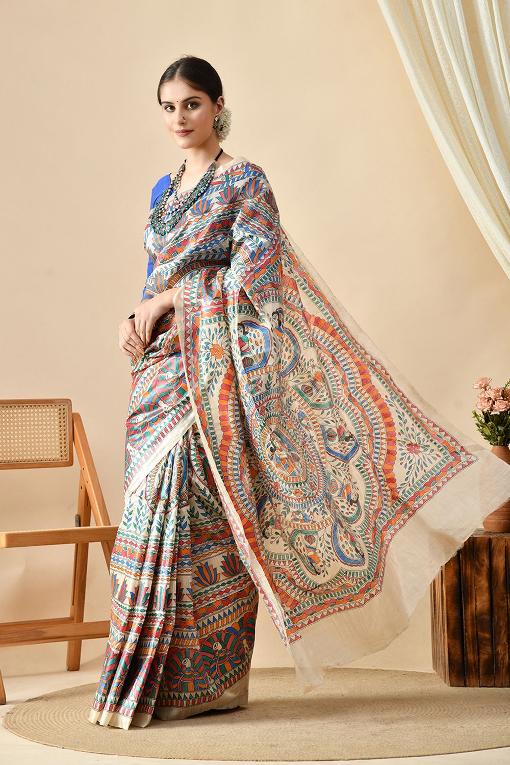 An elegant eco-friendly handwoven tussar silk saree in natural dye, 6.5 mtr. in length. Best maintained with dry cleaning.