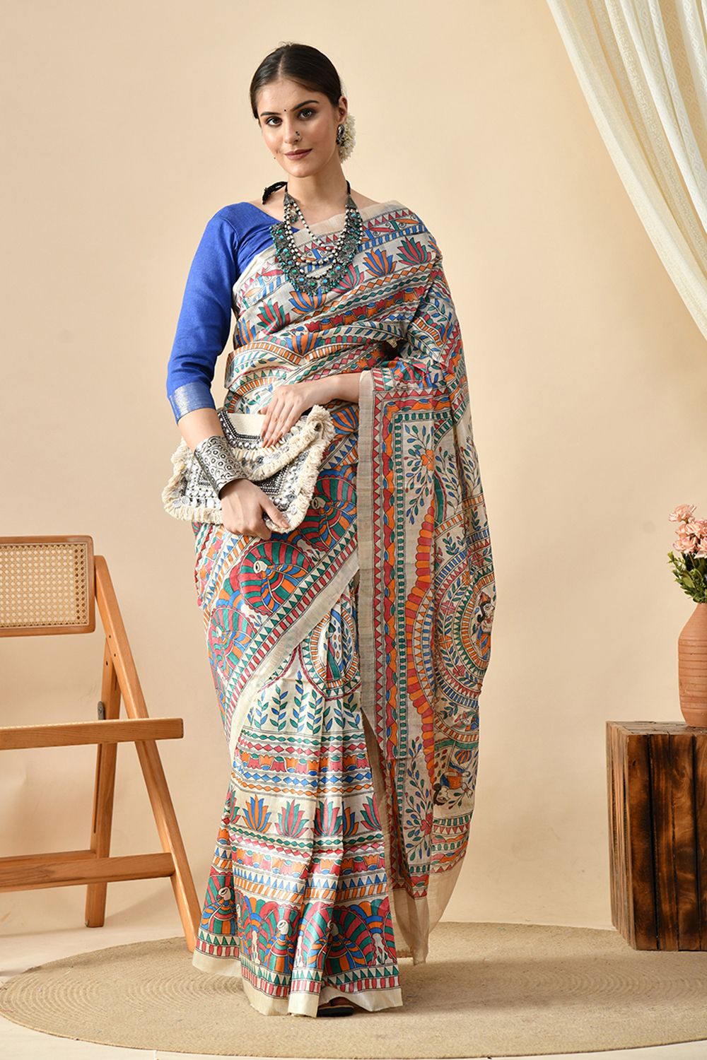 An elegant eco-friendly handwoven tussar silk saree in natural dye, 6.5 mtr. in length. Best maintained with dry cleaning.