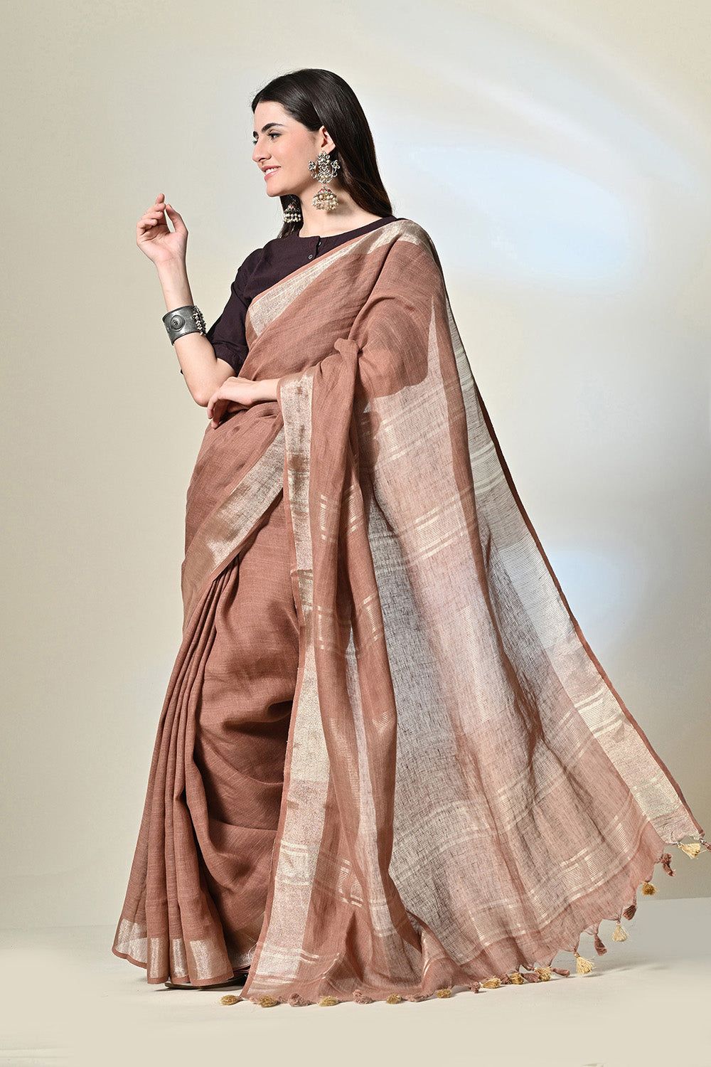 Eco-friendly 6.5 mtr brown linen saree dyed with natural Catechu, perfect for vegan and eco-conscious fashion, dry clean recommended.