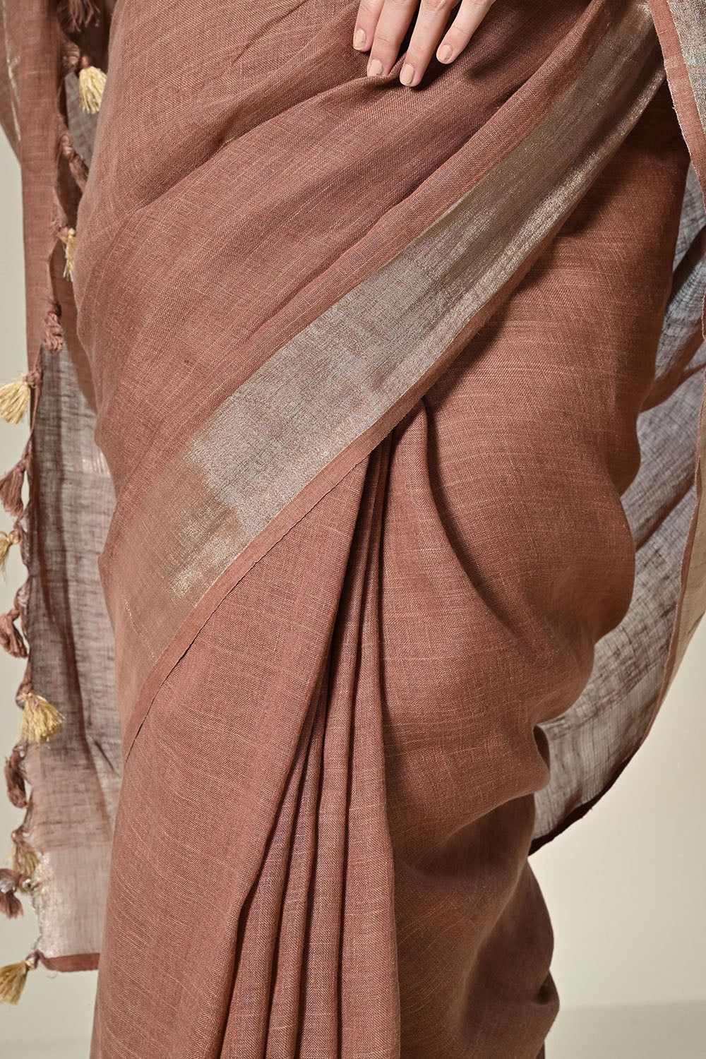 Eco-friendly 6.5 mtr brown linen saree dyed with natural Catechu, perfect for vegan and eco-conscious fashion, dry clean recommended.