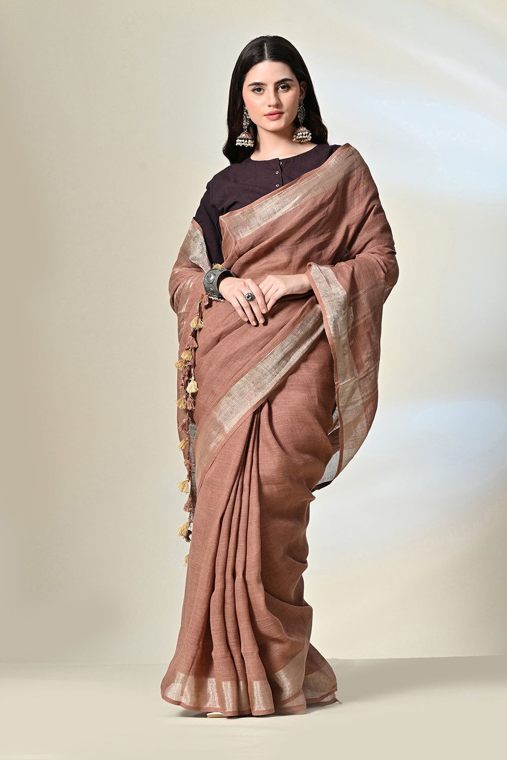 Eco-friendly 6.5 mtr brown linen saree dyed with natural Catechu, perfect for vegan and eco-conscious fashion, dry clean recommended.
