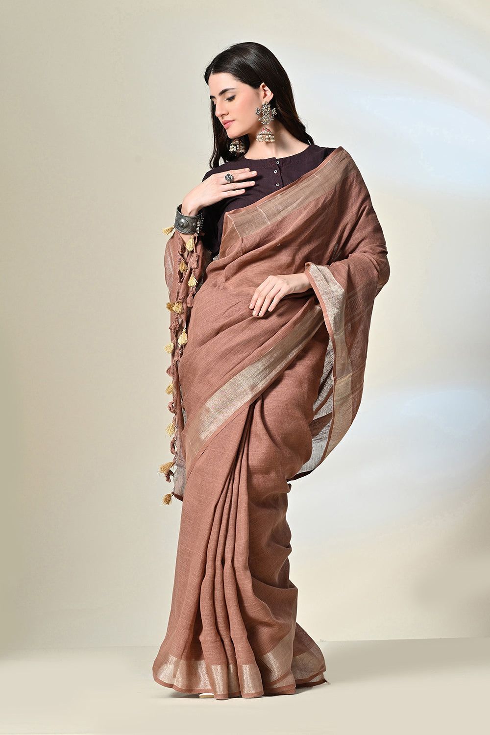 Eco-friendly 6.5 mtr brown linen saree dyed with natural Catechu, perfect for vegan and eco-conscious fashion, dry clean recommended.