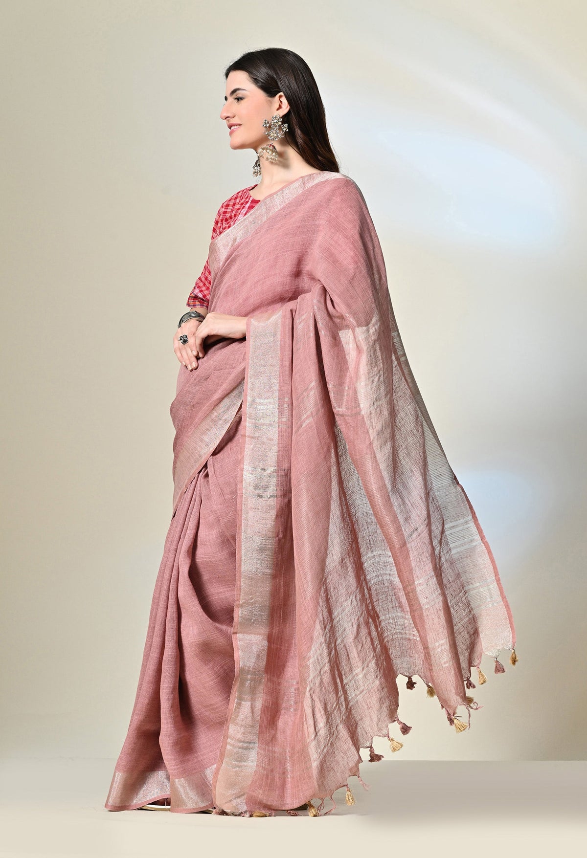 Elegant pink colour pure linen saree, dyed organically with Manjistha, a traditional Indian attire