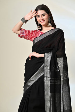 Black pure linen saree of 6.5 mtr length, dyed naturally with Myrobalan and fermented iron water, suitable for dry cleaning