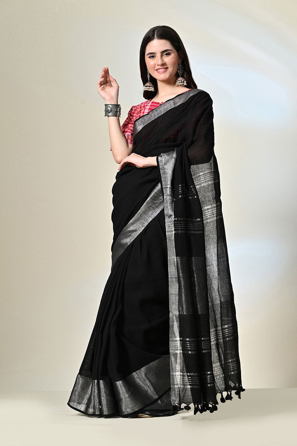 Black pure linen saree of 6.5 mtr length, dyed naturally with Myrobalan and fermented iron water, suitable for dry cleaning