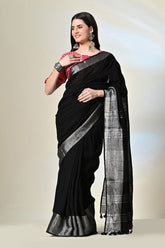 Black pure linen saree of 6.5 mtr length, dyed naturally with Myrobalan and fermented iron water, suitable for dry cleaning