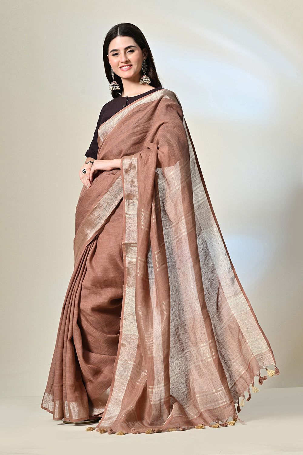 Eco-friendly 6.5 mtr brown linen saree dyed with natural Catechu, perfect for vegan and eco-conscious fashion, dry clean recommended.