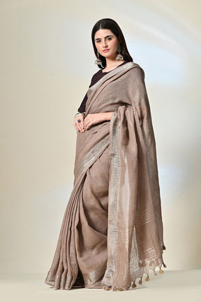 Elegant rust grey, 6.5 mtr. long brown linen saree naturally dyed with catechu, promoting sustainable and organic fashion.