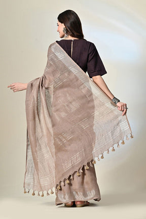 Elegant rust grey, 6.5 mtr. long brown linen saree naturally dyed with catechu, promoting sustainable and organic fashion.