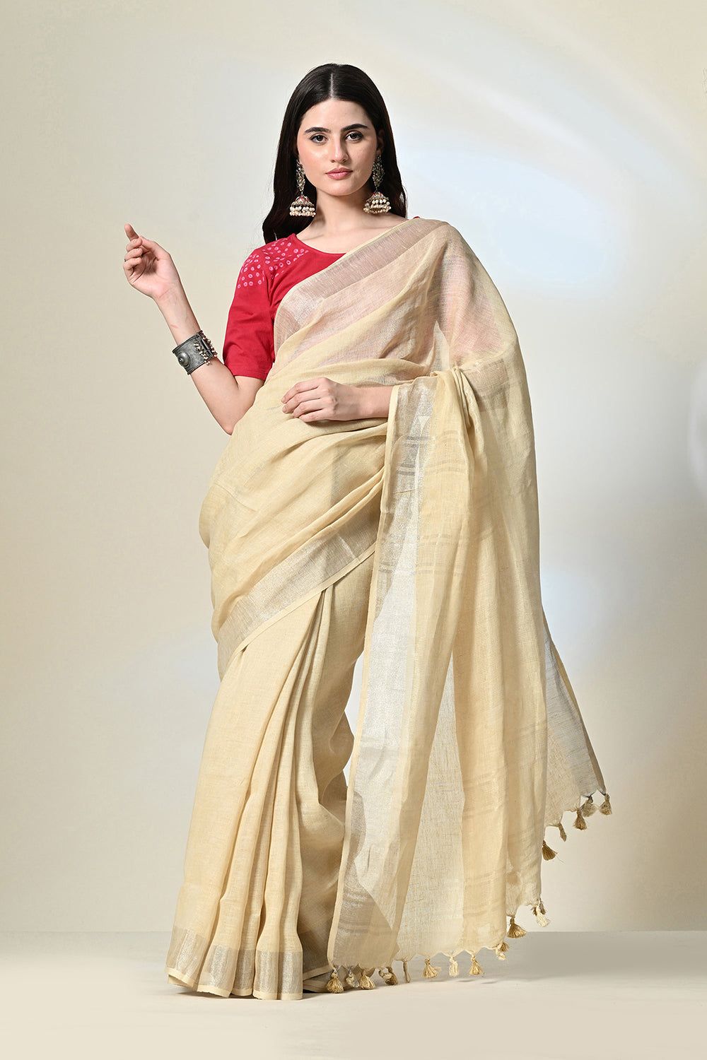 Eco-conscious light yellow linen saree with natural pomegranate dye, part of biodegradable fashion range, dry clean to maintain quality