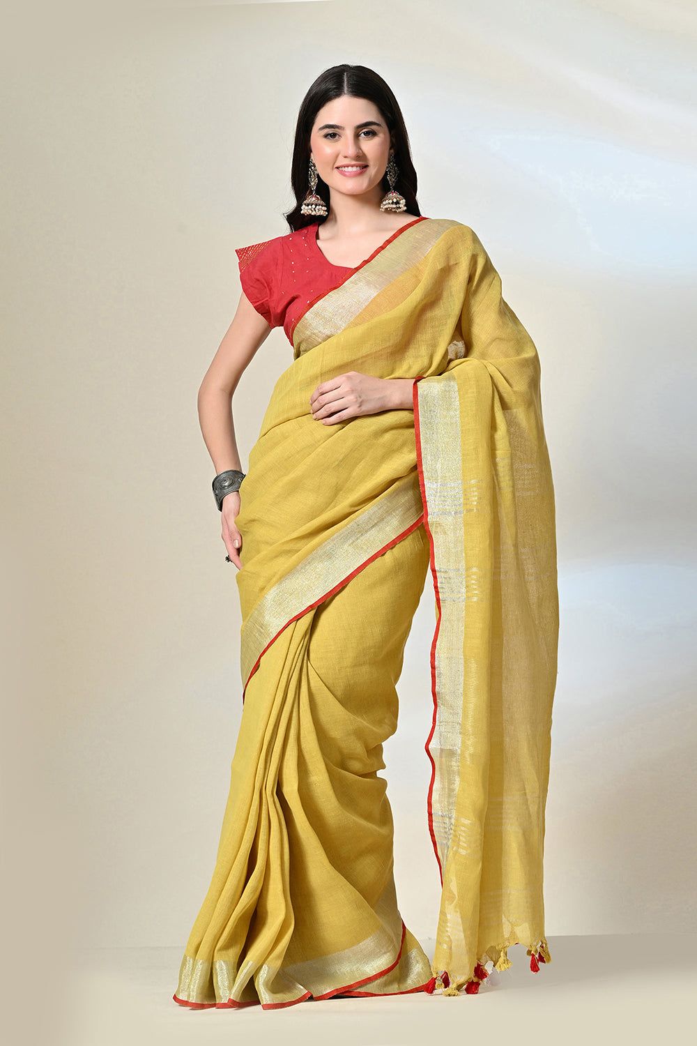 Mustard Linen saree of 6.5 mtr length, dyed with organic pomegranate in natural dyeing methods, ideal for vegan and eco-textile trend lovers.