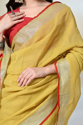 Mustard Linen saree of 6.5 mtr length, dyed with organic pomegranate in natural dyeing methods, ideal for vegan and eco-textile trend lovers.