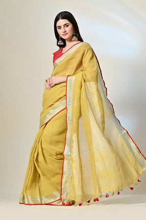 Mustard Linen saree of 6.5 mtr length, dyed with organic pomegranate in natural dyeing methods, ideal for vegan and eco-textile trend lovers.