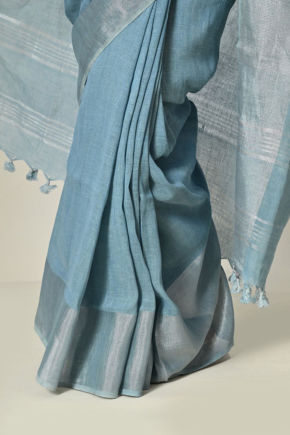 Light indigo Linen saree dyed with natural Neeli, perfect for eco-friendly traditional wear, available for online purchase.