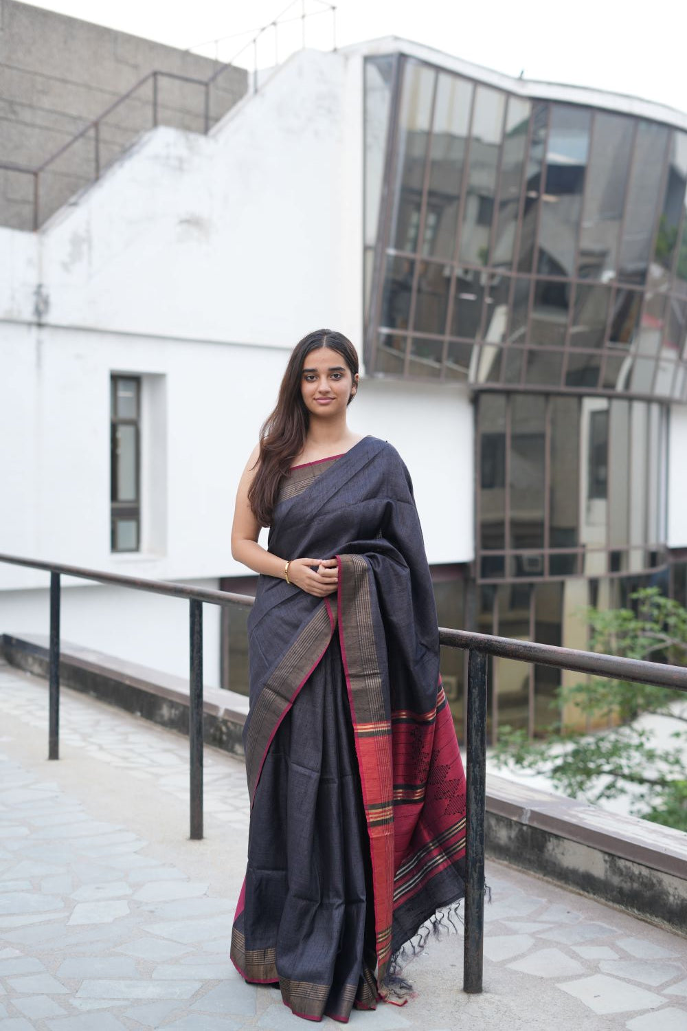 Black Tussar Silk Elegance: Handloom Saree with Artistic Weaved Border